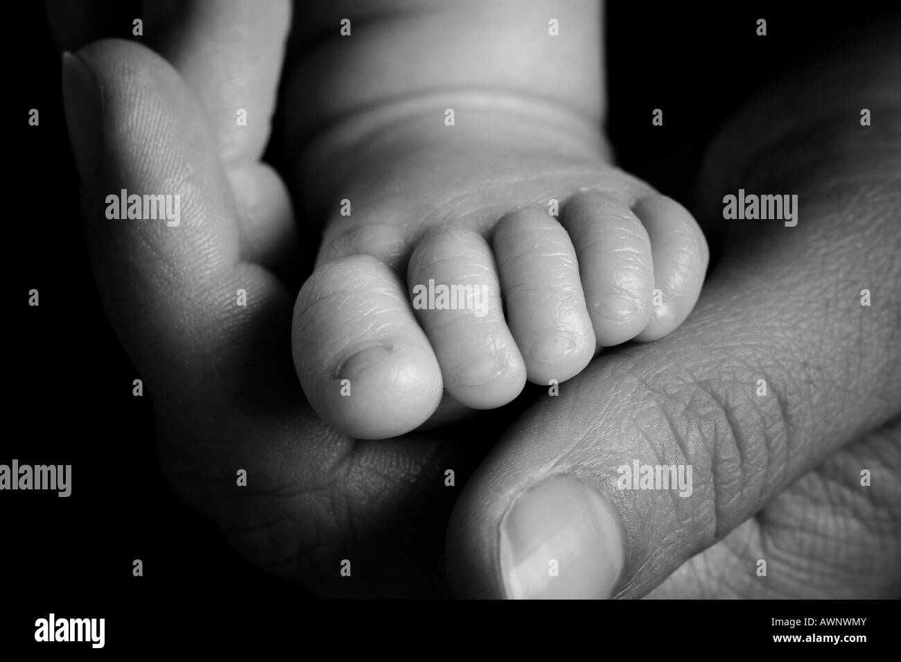 Pied d'un bébé de quatre semaines Banque D'Images