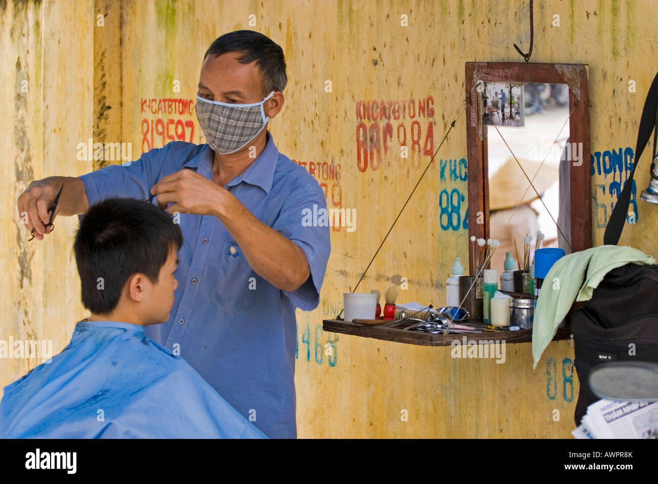 Coiffure sur une rue, Nha Trang, Vietnam, Asie Banque D'Images