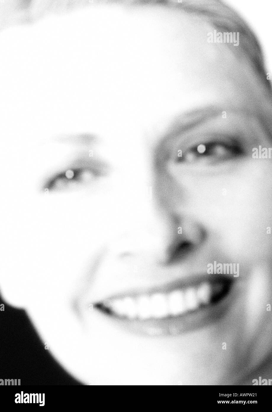 Young woman smiling, close-up, portrait, b&w Banque D'Images