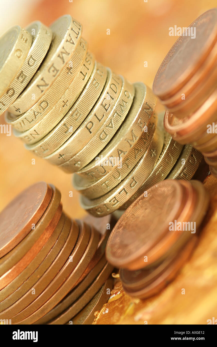 Close up, macro photographie de la monnaie britannique, la livre de pièces, et des pièces de bronze, Banque D'Images