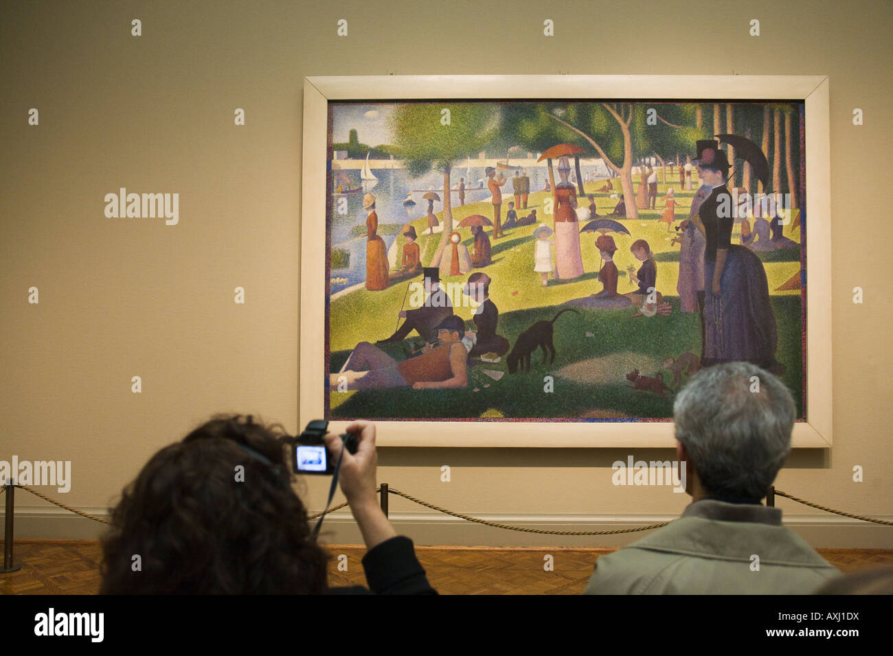 Chicago Illinois visualisation visiteurs dimanche sur la grande peinture impressionniste Charles Seurat Art Institute de Chicago Banque D'Images