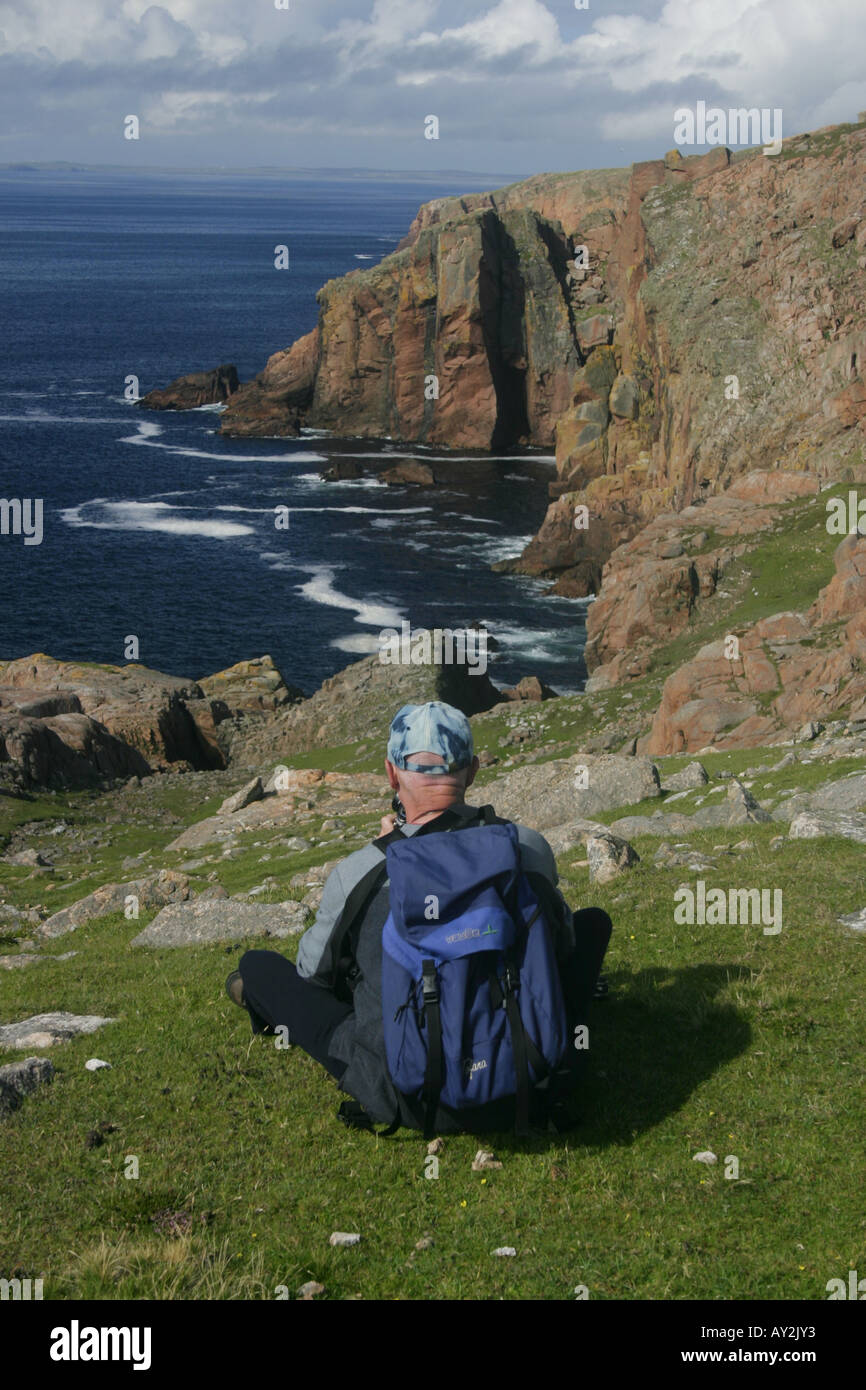 Photographe sur l'île de Muckle Roe, Shetland Banque D'Images