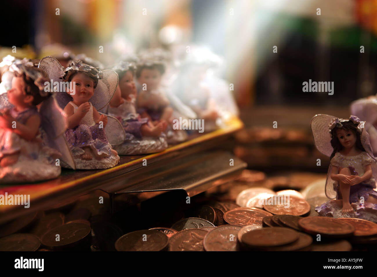 Fées jouet avec 2p pièces en salle de jeux électroniques Game Banque D'Images