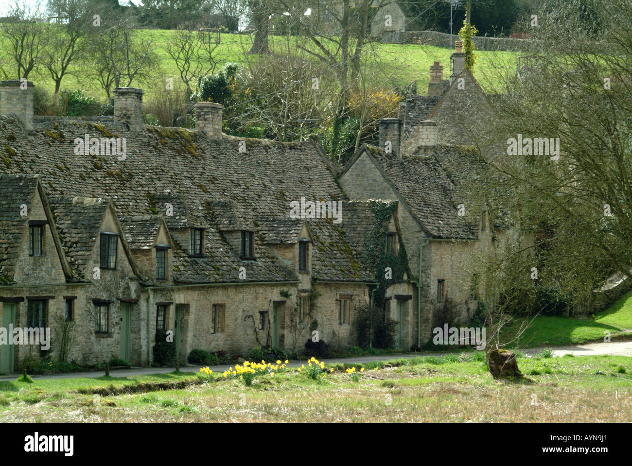 Arlington Row cottages, Bibury, Gloucestershire, Angleterre, Royaume-Uni au printemps. Banque D'Images