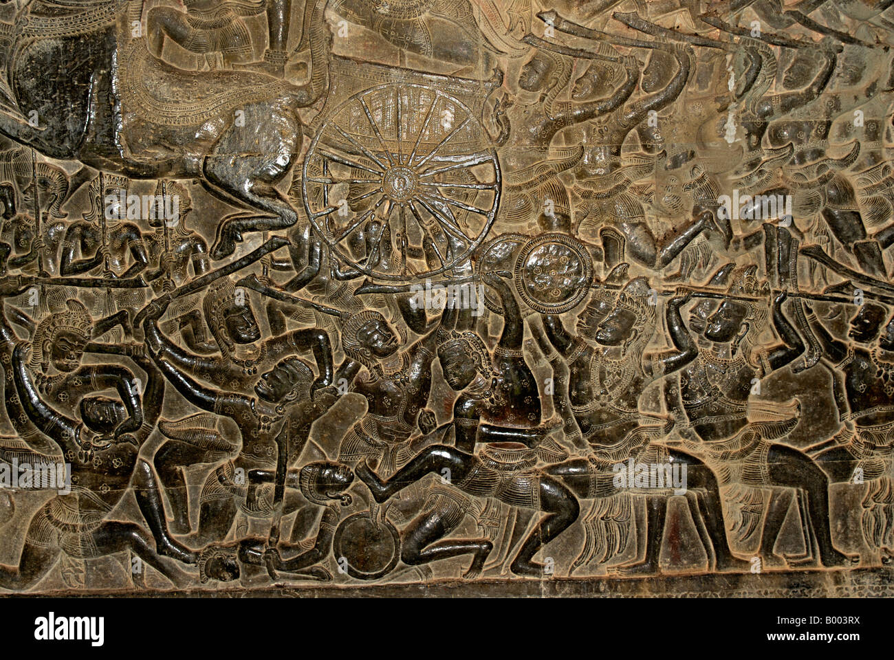 Cambodge, Angkor Wat, début 12ème siècle. Scène de bataille sur char niveau supérieur est de l'extra-Gallery. Banque D'Images
