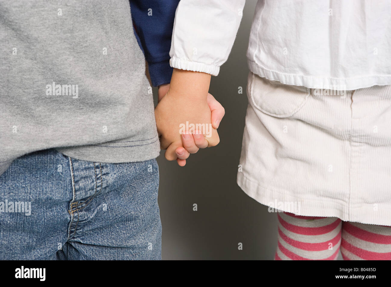A Boy And Girl Holding Hands Photo Stock Alamy A Boy And Girl Holding Hands Photo Stock Alamy