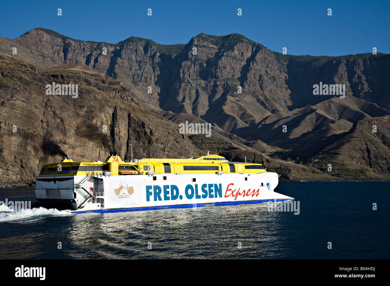 Fred Olson Bentago catamaran ferry express laissant Puerta de las Nieves Gran Canaria 'Canaries' Espagne Banque D'Images