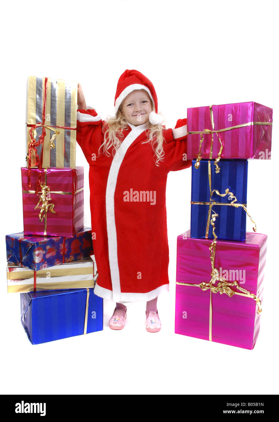 Fille de Noël avec les cadeaux de Noël Banque D'Images