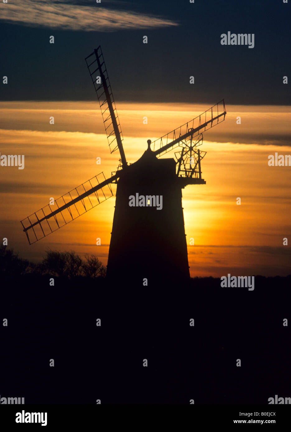Moulin d'ossature Burnham Overy Norfolk poster mill sunset sails le paysage anglais East Anglia Angleterre UK Banque D'Images