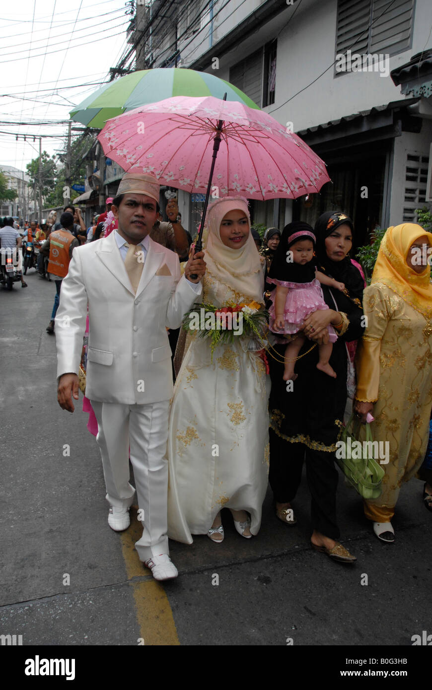 Partie de mariage musulman rituel, mariés à la parade à la mosquée, Bangkok, Thaïlande Banque D'Images