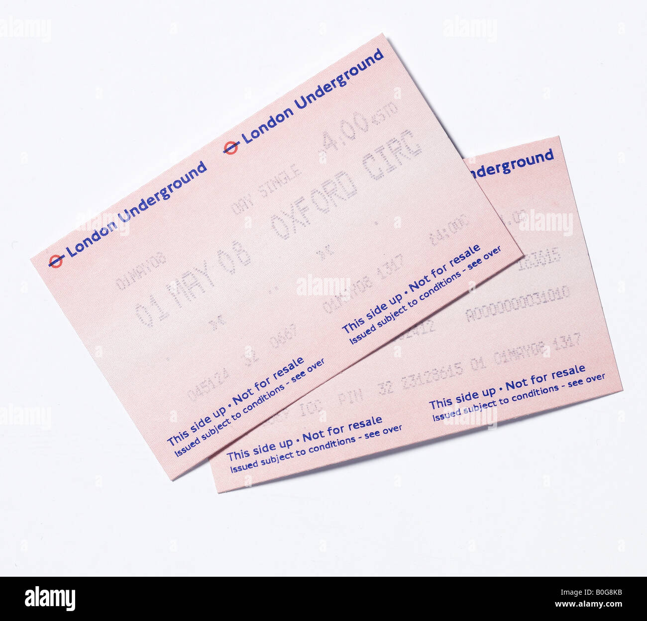 Deux billets de métro de Londres sur fond blanc Banque D'Images