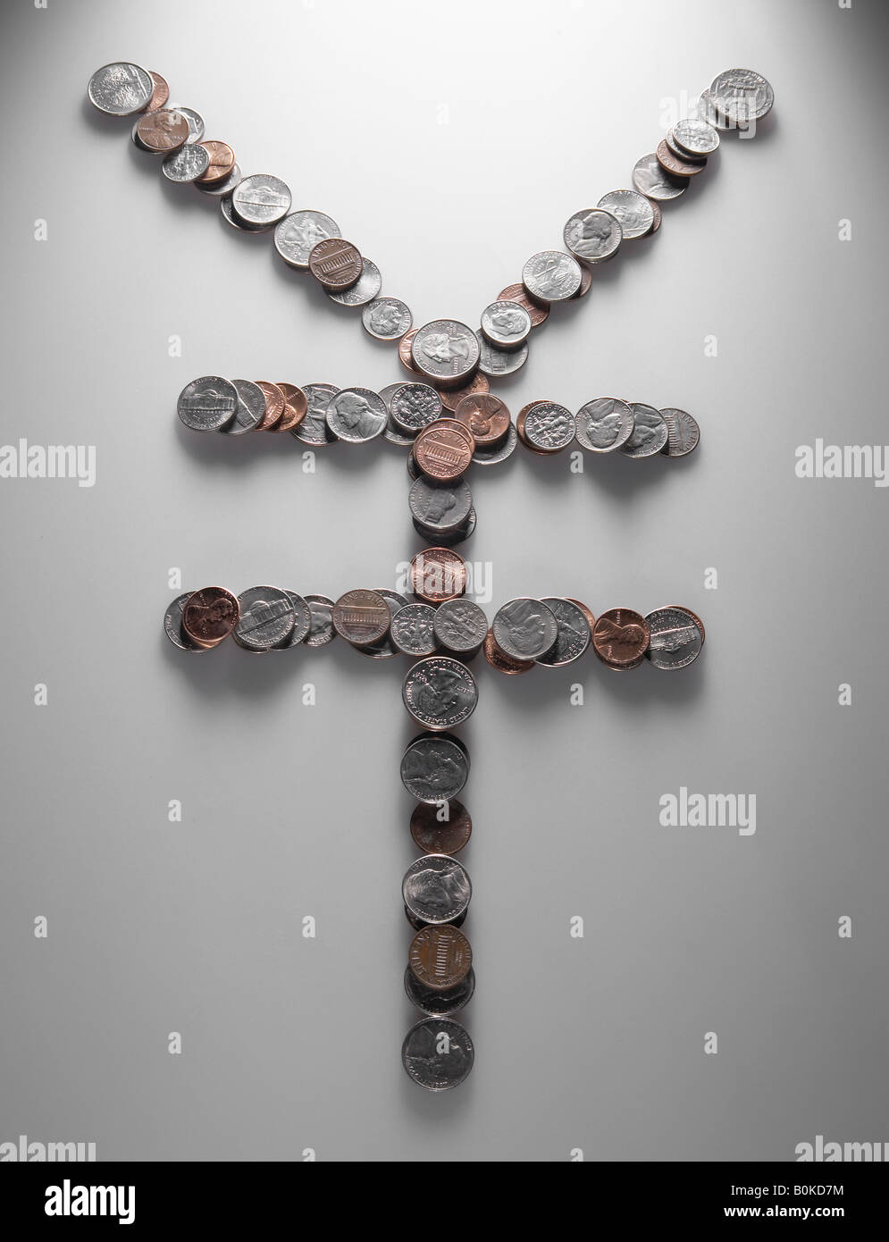 Yen Sign Made of US Coins Banque D'Images