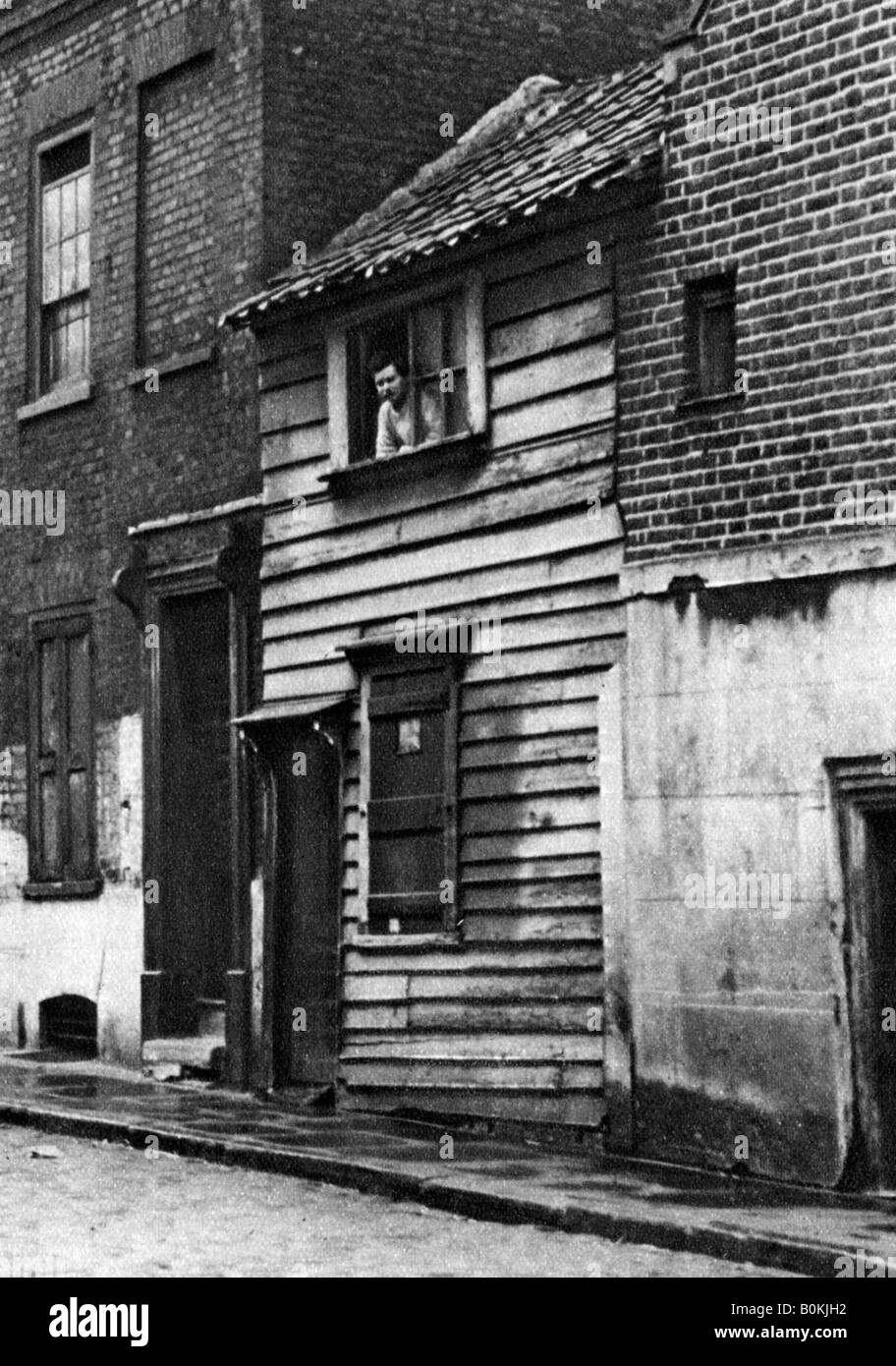 Une vieille maison de bois à St John's Hill, Shadwell, Londres, 1926-1927.Artist : çois Dortier Banque D'Images