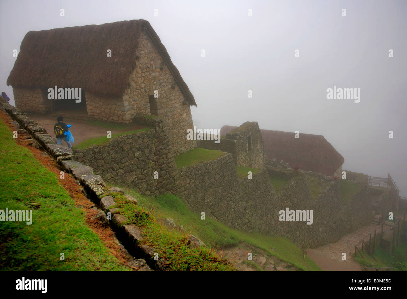 Machu Picchu Guardian Maisons Secteur agricole de la vallée de la rivière Urubamba Ville Perdue Andes Pérou Amérique du Sud au Patrimoine Mondial de l'UNESCO Banque D'Images