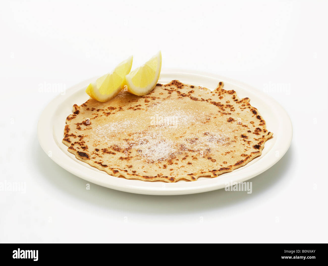 Pancake avec tranche de citron et du sucre Banque D'Images