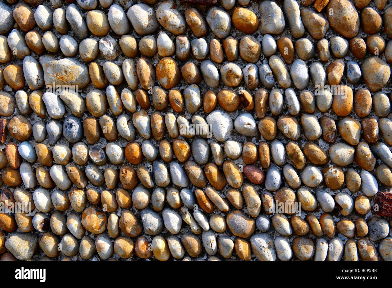 Close up of Suffolk traditionnel mur de pierre de silex Banque D'Images