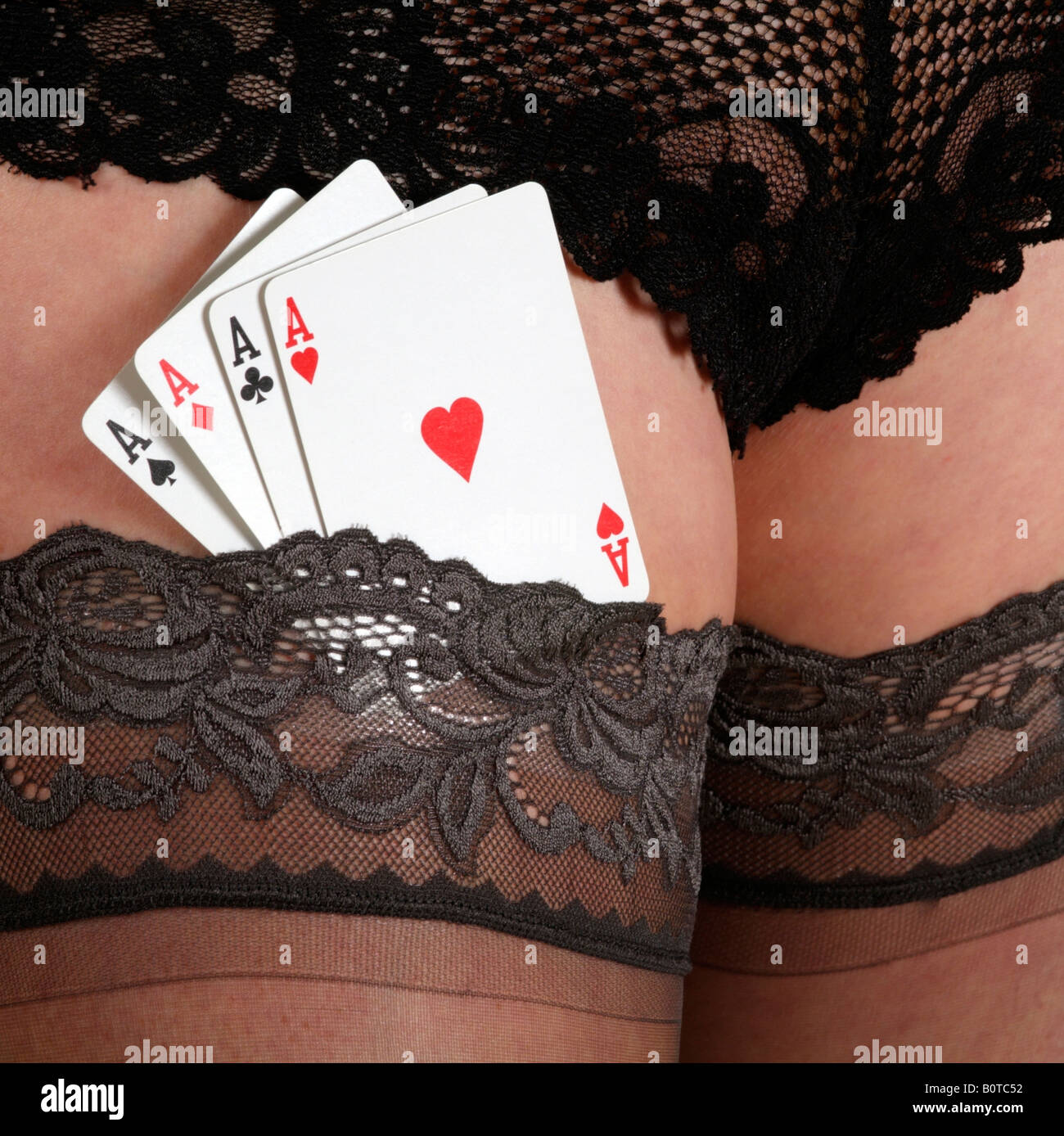 Quatre As cartes à jouer dans l'empoissonnement de womans top Banque D'Images