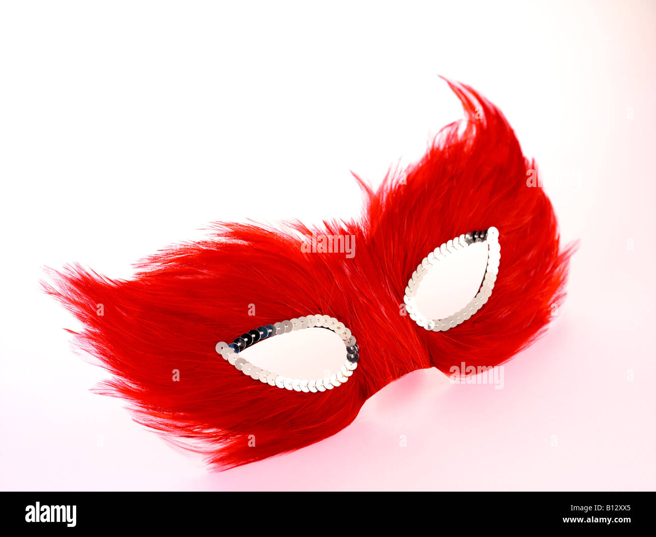 Mascarade masque yeux rouge Banque D'Images