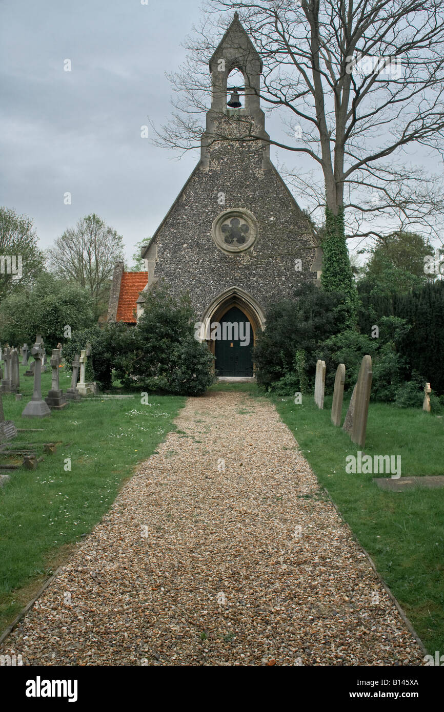 L'angleterre église cimetière mur silex eton norman vieux murs Banque D'Images