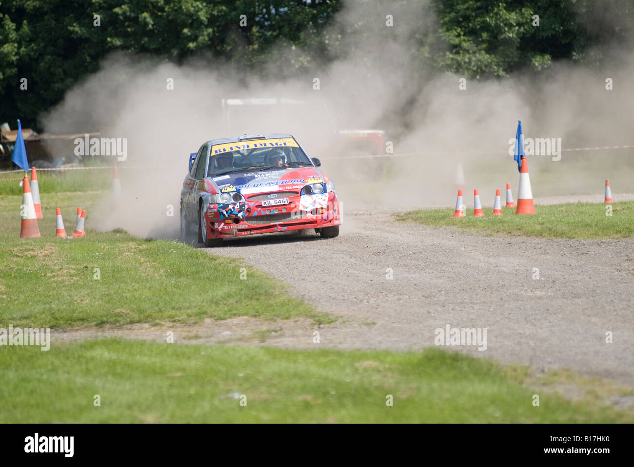 Ford Escort voiture rallye rallye off road racing stade poussiéreux poussière rapide vitesse cosworth coups jusqu'gravel Banque D'Images