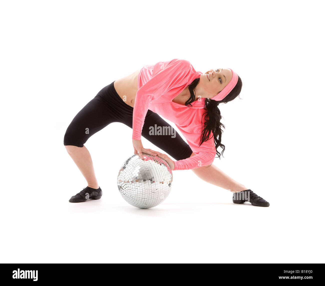 Photo de dancer girl avec glitterball over white Banque D'Images