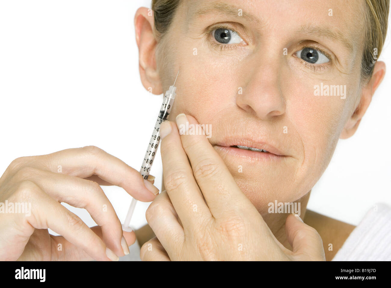 Femme s'offre des injection de Botox, close-up Banque D'Images