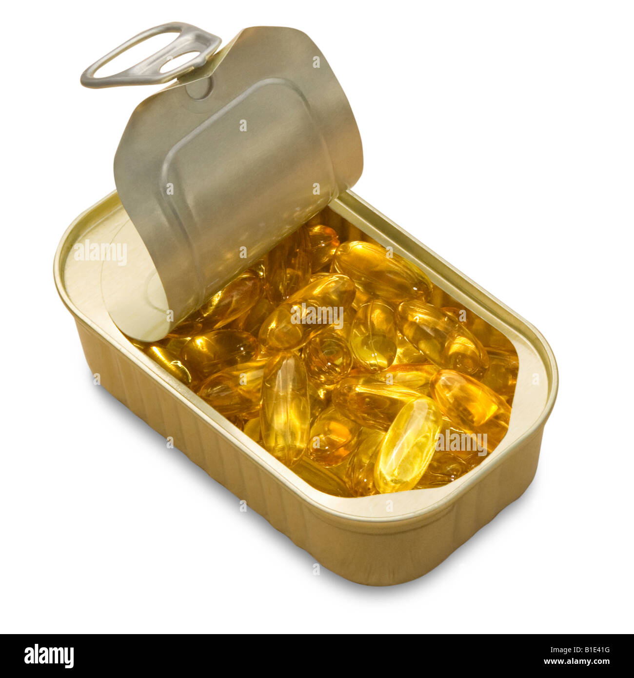 Des capsules d'huile de poisson a ordonné au hasard dans un anneau de fer-blanc sur fond blanc. Décoration Banque D'Images