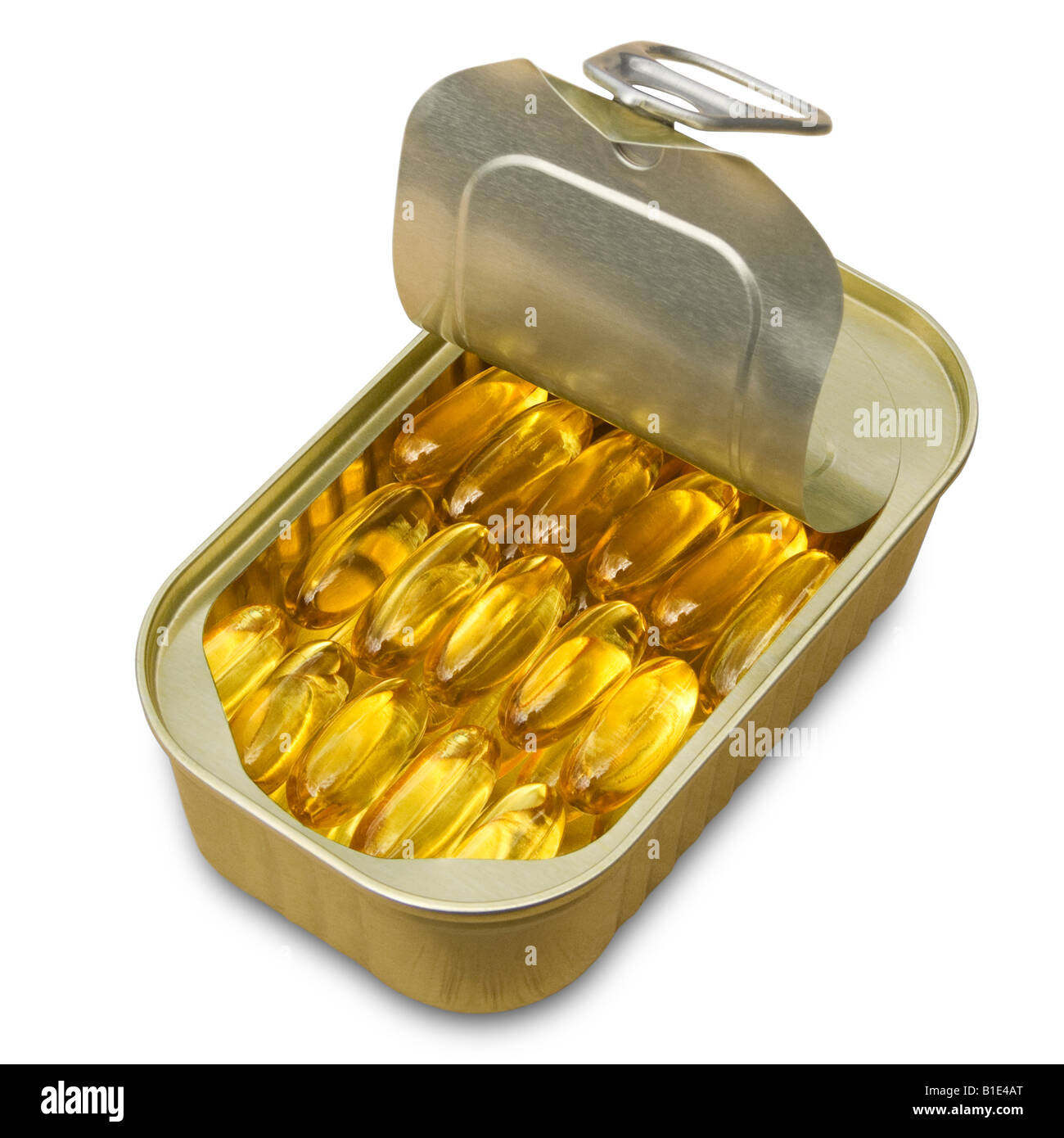 Des capsules d'huile de poisson sont soigneusement disposées dans un anneau fer-blanc sur un fond blanc. Décoration Banque D'Images