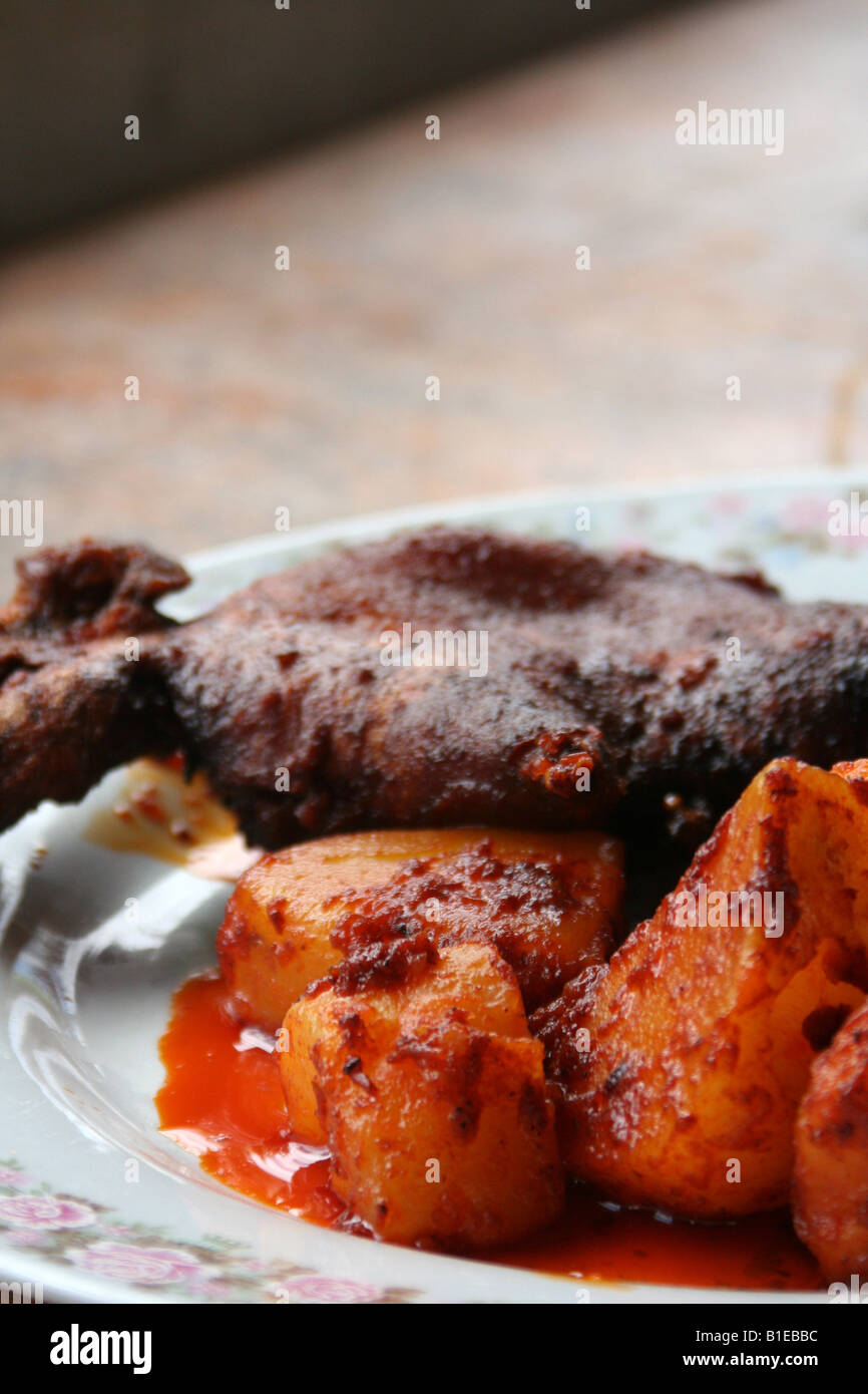 Picante De Cuy Cuy Epice Un Cobaye Aka Plat De Pommes De Terre Et Dans Les Hauts Plateaux Du Nord Du Perou Epice A L Aji Les Poivrons Photo Stock Alamy