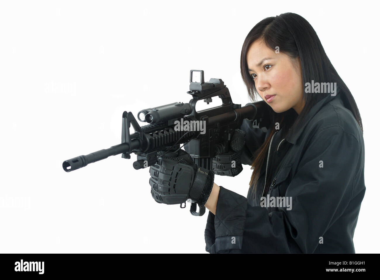 Fille femme gun killer assassin tuer swat sas joint marine force spéciale protéger Ghost in the shell manga bande dessinée japonaise d'amination Banque D'Images