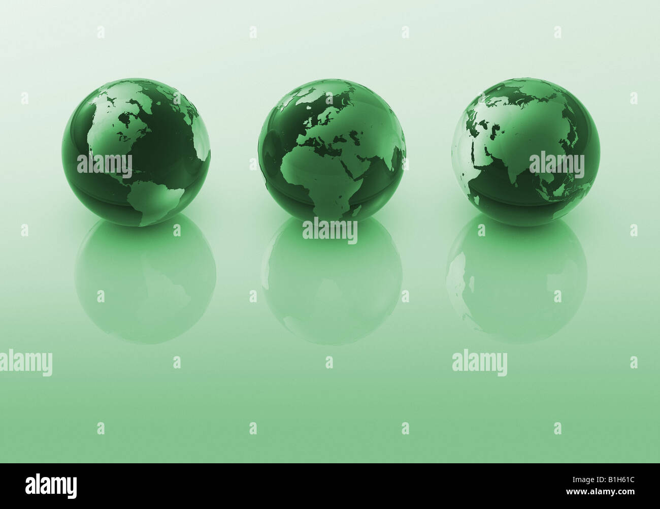 Trois de green globes Banque D'Images