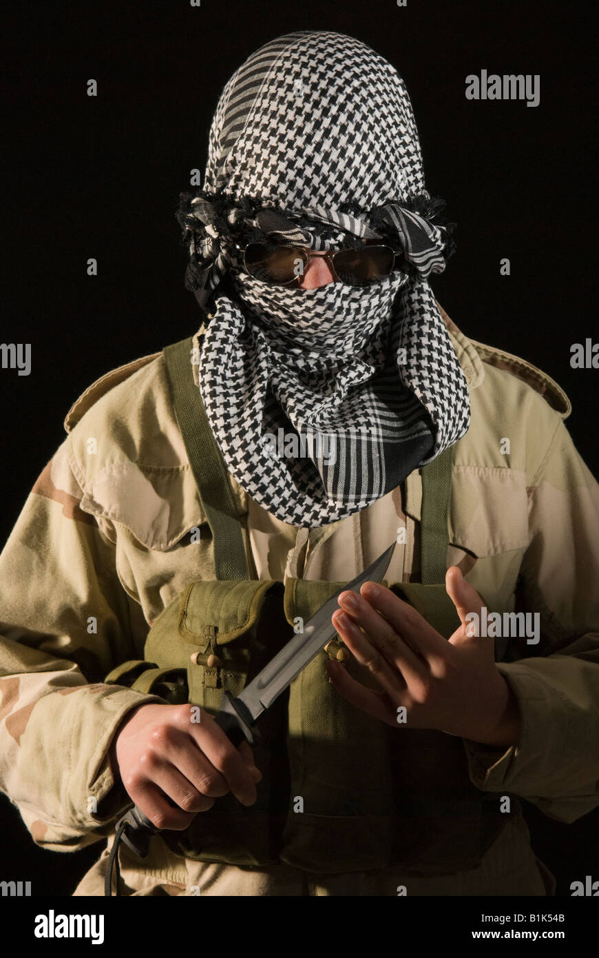 Contrôle de terroristes tranchant du couteau Banque D'Images
