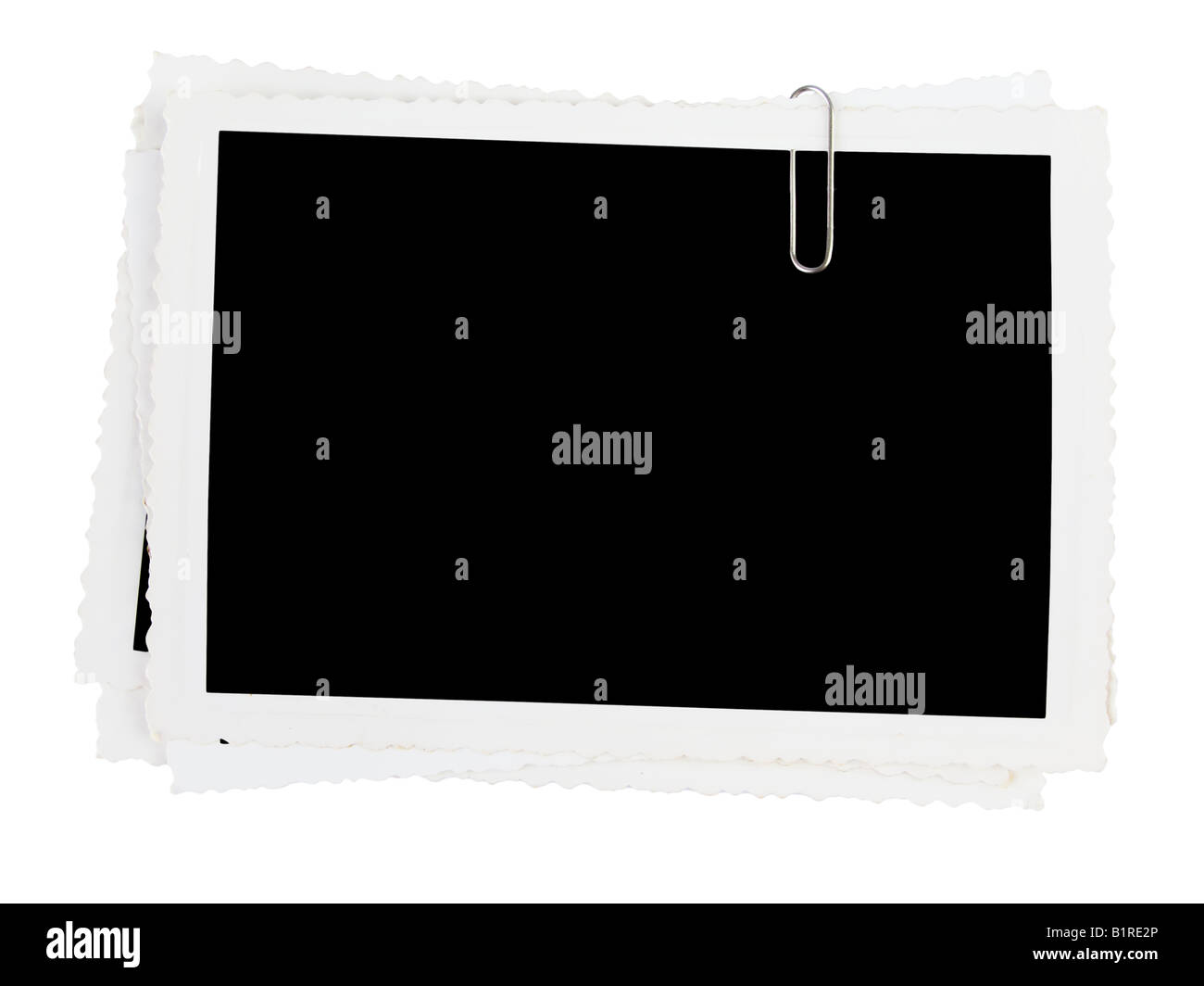 Tas de vieilles photographies isolé sur fond blanc Banque D'Images