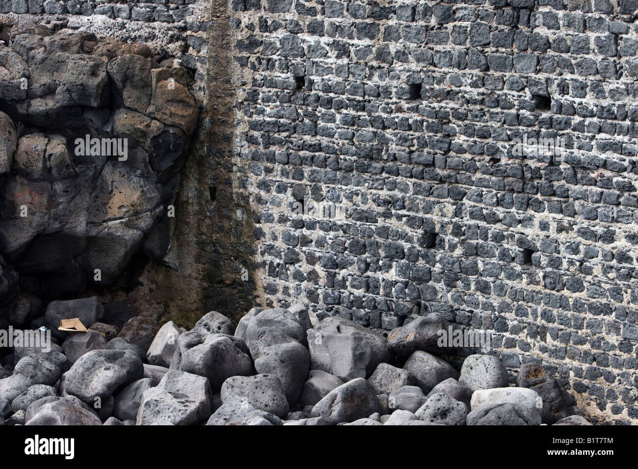 La pierre de bloque un mur de soutènement en briques à Catane, Sicile, Italie Banque D'Images