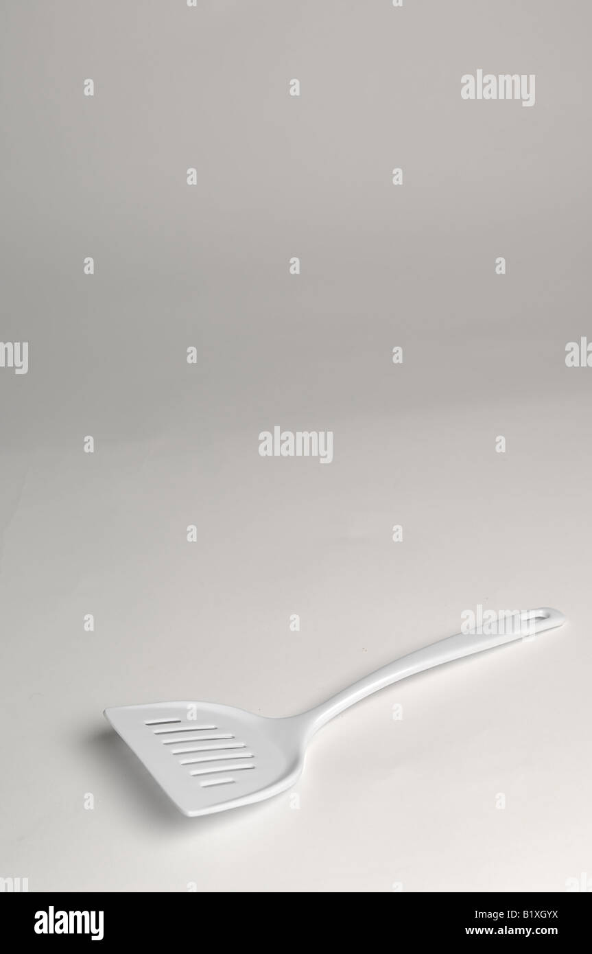 Spatule en plastique blanc Banque D'Images