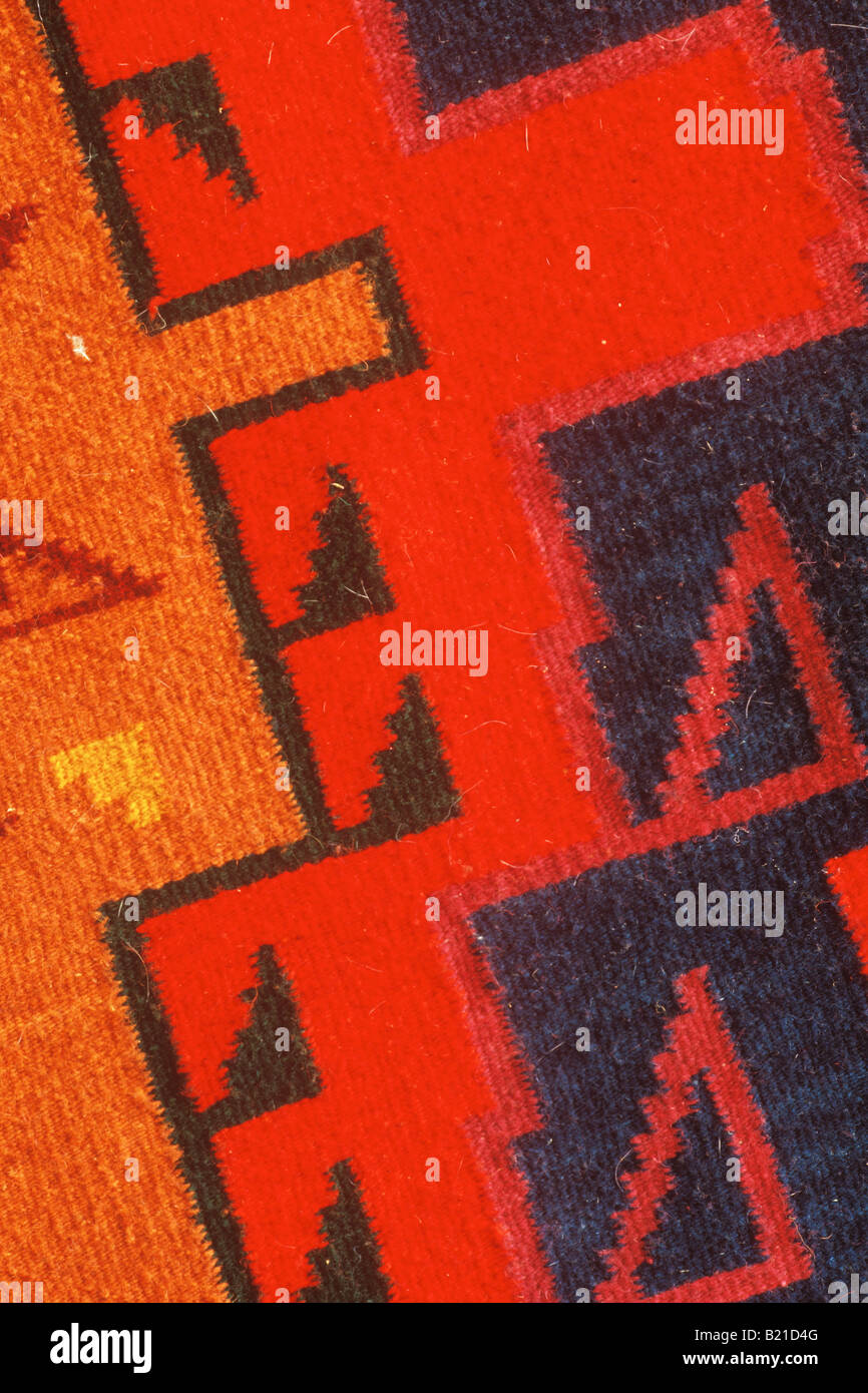 Tapis en laine motif coloré rouge shop Manuel Montano Sanchez Teotitlan Valle de Oaxaca au Mexique Banque D'Images