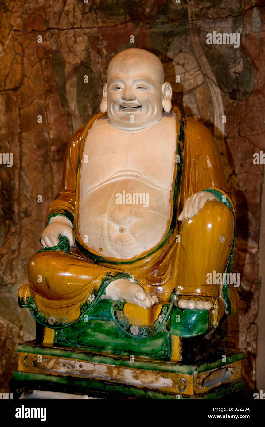 Budai sourire fat monk incarnation du Bouddha de la dynastie Ming ( provevince Henan ad 1486 Xinian Square ) Chine chinois Banque D'Images