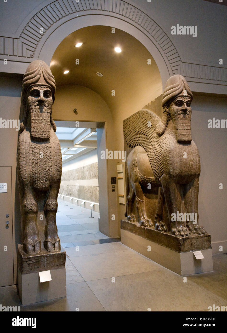 Tête humaine ailé assyrien Entrée par Nimrod British Museum London UK Europe Banque D'Images