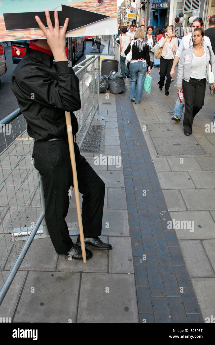 Homme avec un panneau à Londres Banque D'Images