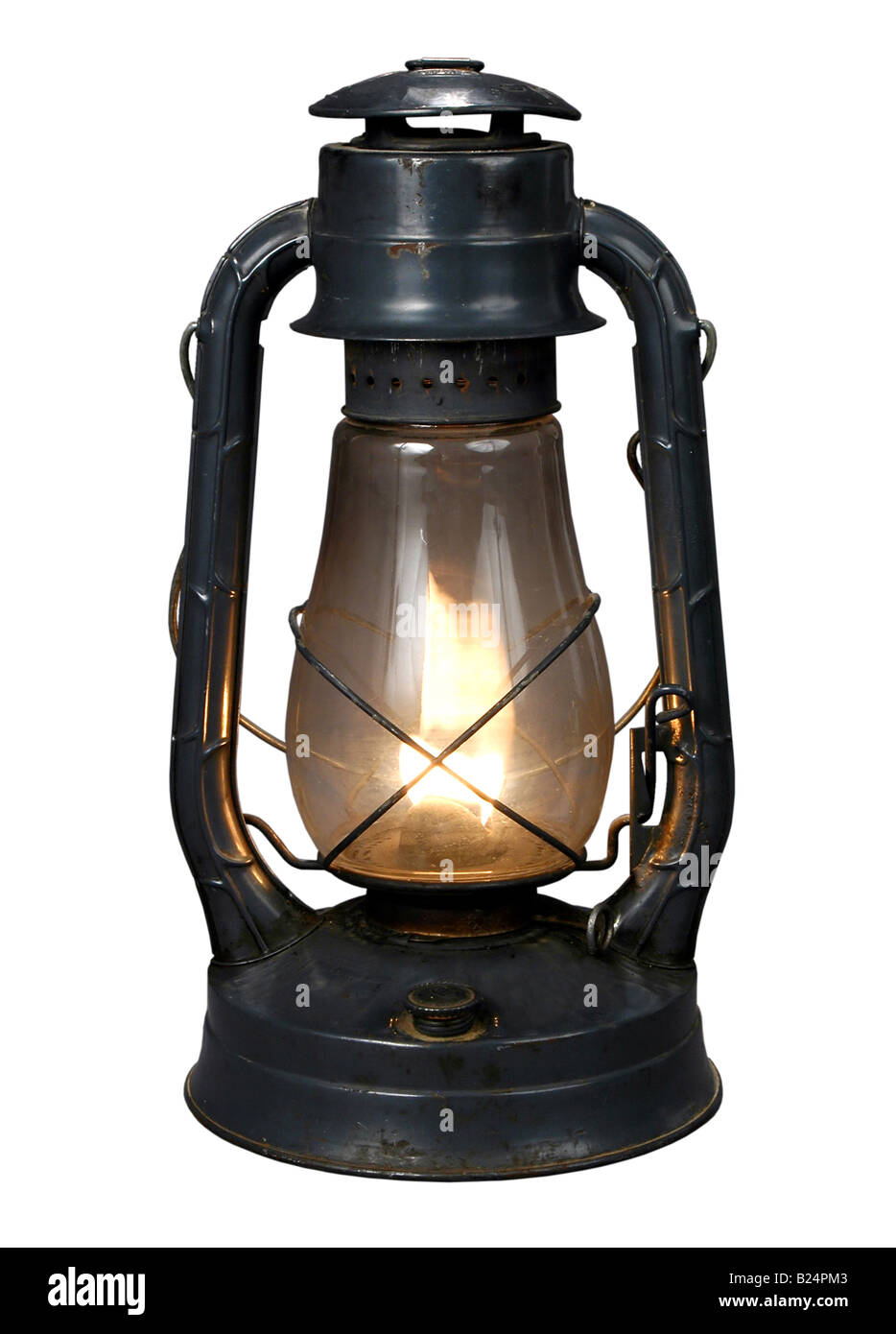 Lampe à huile Antique éclairé isolé sur fond blanc Banque D'Images