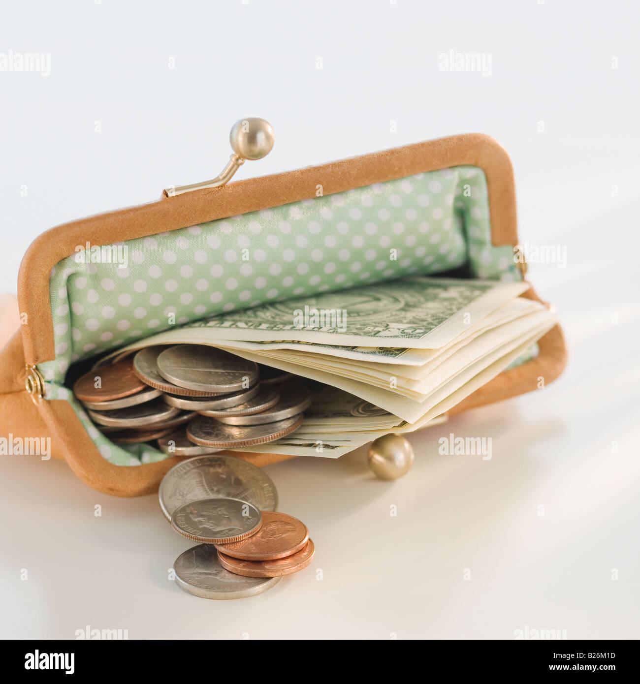 Dans l'argent porte-monnaie ouvert Photo Stock - Alamy