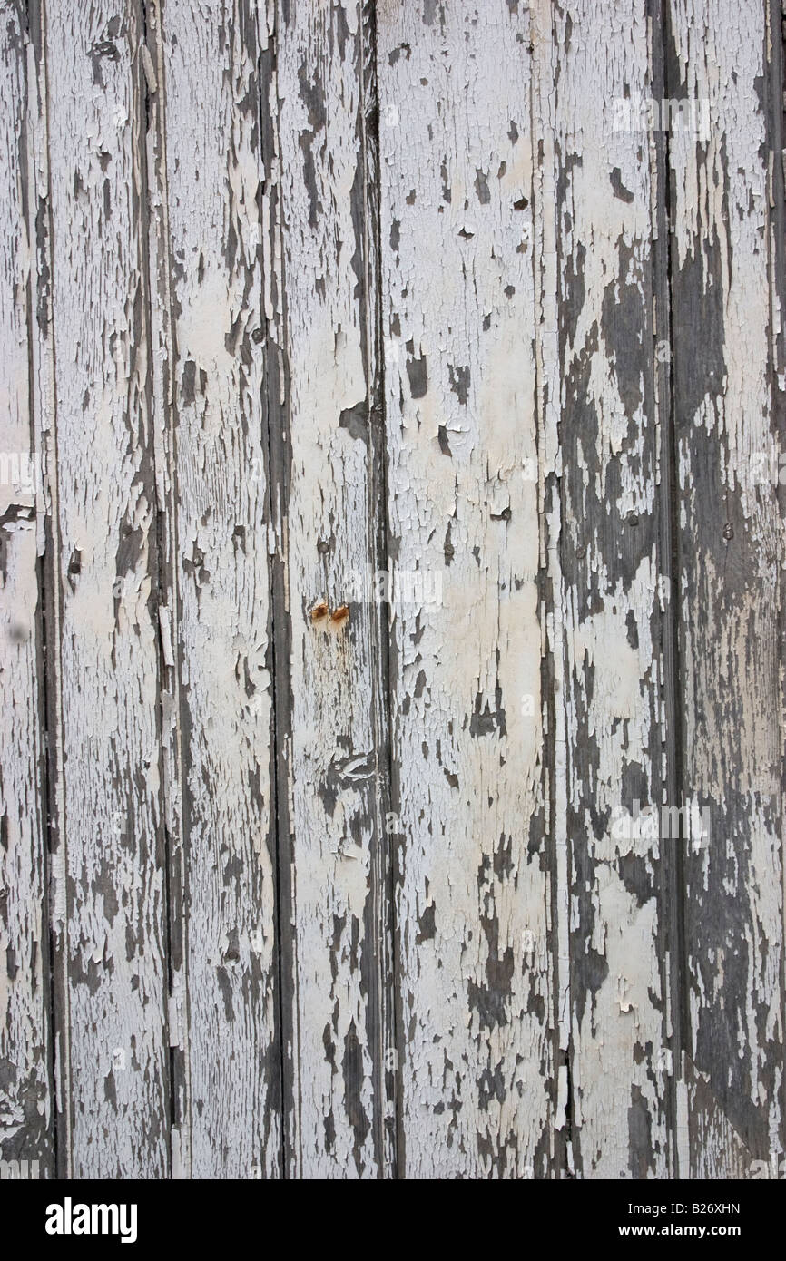 Peinture en détresse sur un panneau de bois patiné, arrière-plan du tableau de peinture déglinguée sortait de l'ancien et rustique panneau peint écaillée Banque D'Images