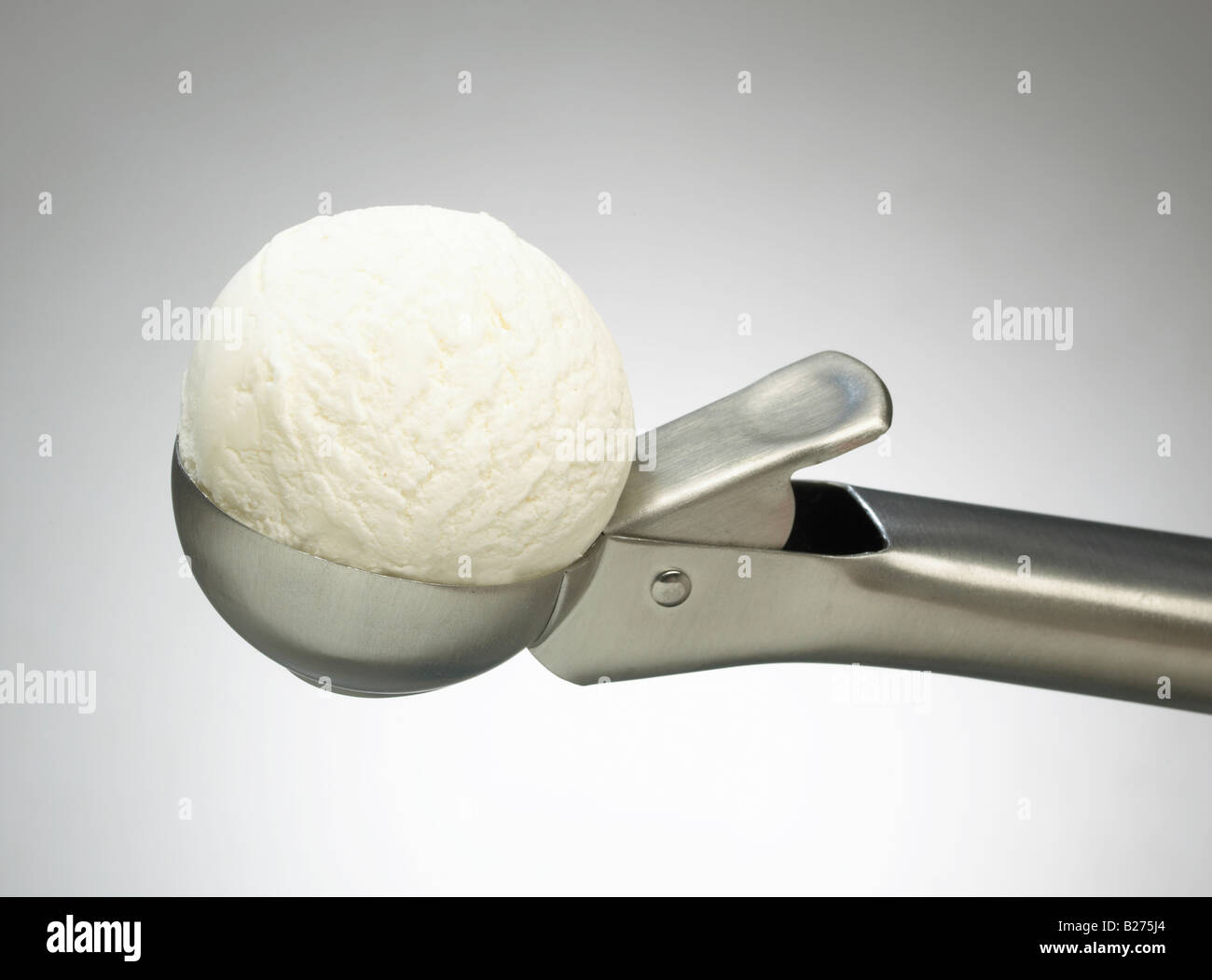 Cuillère à crème glacée de l'ACIER INOXYDABLE, glace vanille Banque D'Images