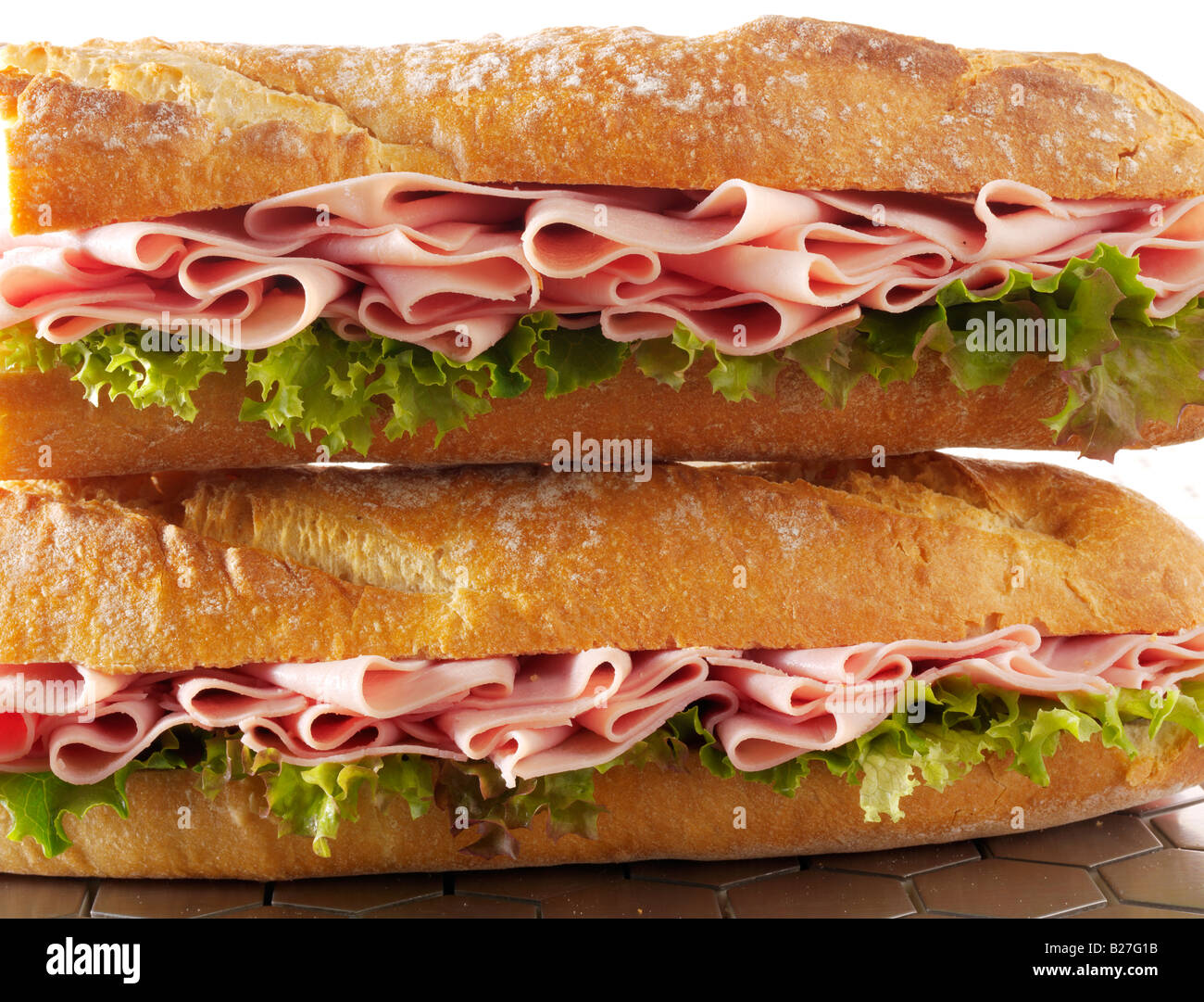 Close up de jambon et de laitue en baguette pain français Banque D'Images