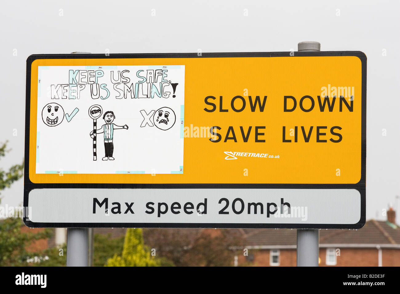École d'anglais à l'extérieur des panneaux routiers indiquant une vitesse maximale de 20 milles à l'heure Banque D'Images