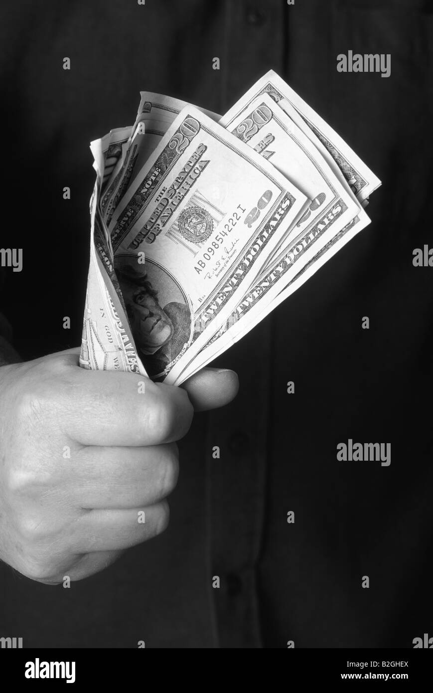Close up concept gris argent libre billets Poignée de Dollars mans serra hand holding liasse de billets de banque billets de dollars Banque D'Images