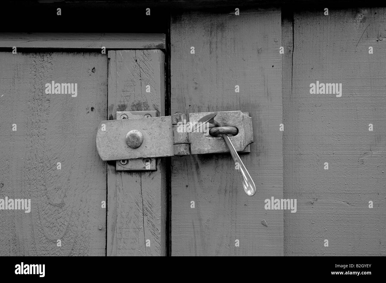 Cuillère, porte en bois et serrure Banque D'Images