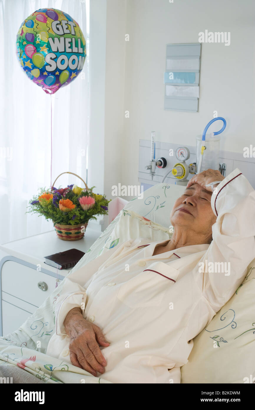 Female patient souffrant d'un mal de tête Banque D'Images