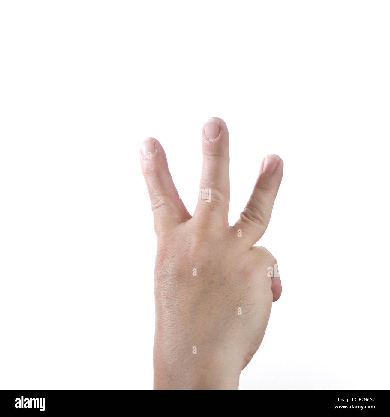 La main avec trois doigts tendus jusqu'à représenter le nombre trois, comme dans un compte à rebours/up Banque D'Images