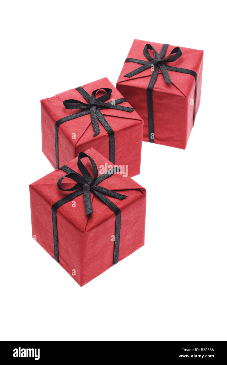 Cadeaux rouge noir avec des arcs et des rubans Banque D'Images